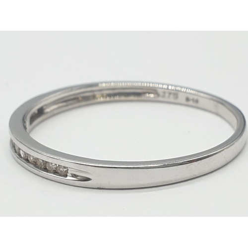 174 - 9ct white gold diamond half eternity ring 0.10ct diamond, 1.3g weight approx and size P