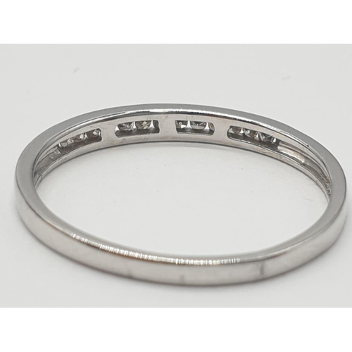 174 - 9ct white gold diamond half eternity ring 0.10ct diamond, 1.3g weight approx and size P