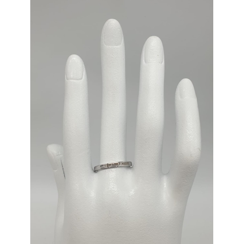 174 - 9ct white gold diamond half eternity ring 0.10ct diamond, 1.3g weight approx and size P