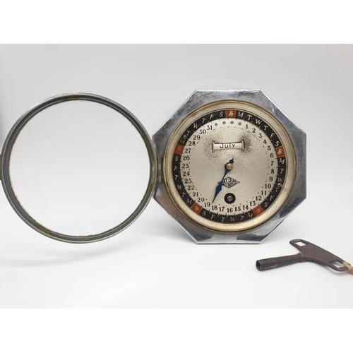 175 - Hofmeier date calender clock with key, 15cm diameter.