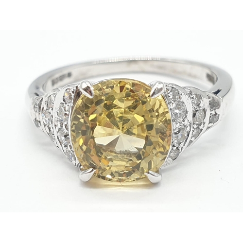 18 - 3.5ct Natural Sri Lankan yellow sapphire shape oval stone in a vintage platinum setting. Weighs 5.3g... 