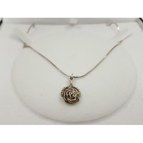 314 - New STERLING SILVER ROSE in a presentation box.  7g.