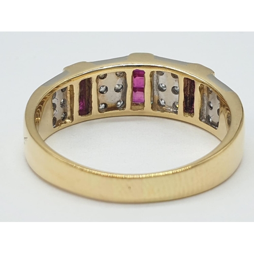 39 - 18ct Gold diamond and ruby ring. Weighs 5.1g and size Q.