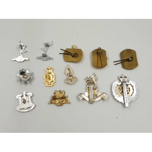 416 - 12 x military CAP BADGES