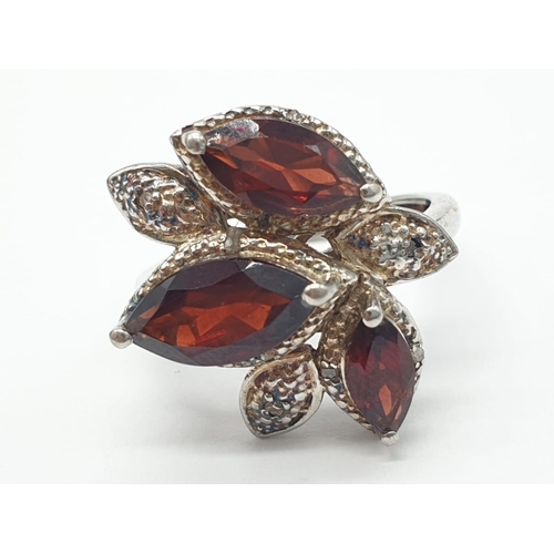 456 - Silver Garnet ring, weight 5.3g and size O