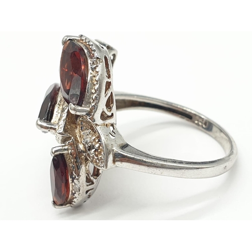 456 - Silver Garnet ring, weight 5.3g and size O