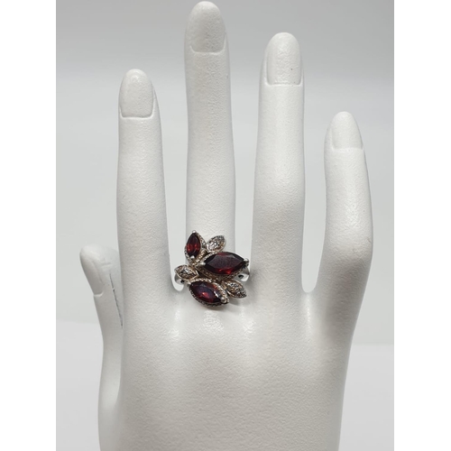 456 - Silver Garnet ring, weight 5.3g and size O