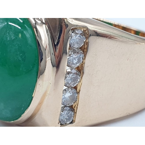 46 - 18ct Gold ring with natural jade stone and diamond shoulders. 16.2g total weight and size R.