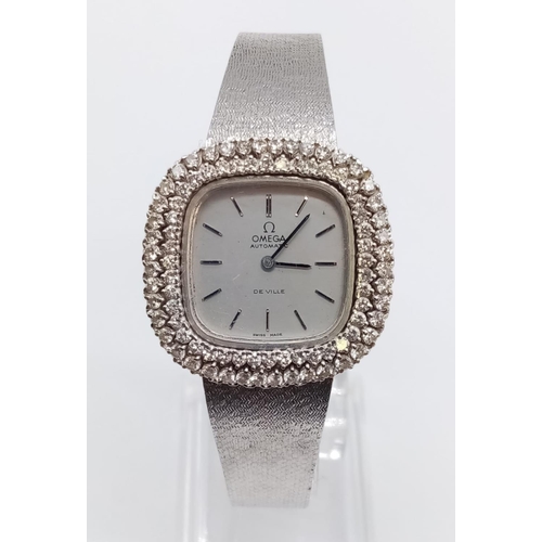 55 - Vintage 18ct white gold OMEGA de Ville ladies automatic watch, square face with diamond encrusted be... 