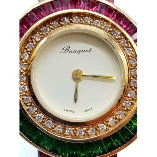 69 - Vintage Bouquet 18ct gold ladies dress watch, round face with emerald, ruby and diamonds surround, 3... 