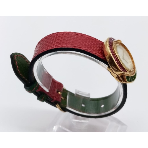 69 - Vintage Bouquet 18ct gold ladies dress watch, round face with emerald, ruby and diamonds surround, 3... 