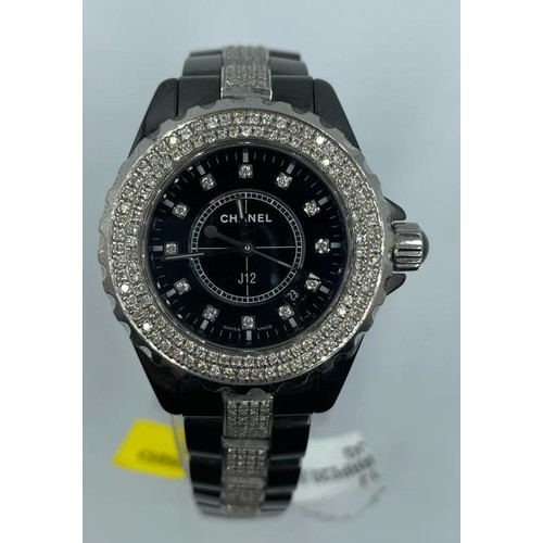 54 - Chanel ceramic quart watch, black face with full diamond bezel and strap