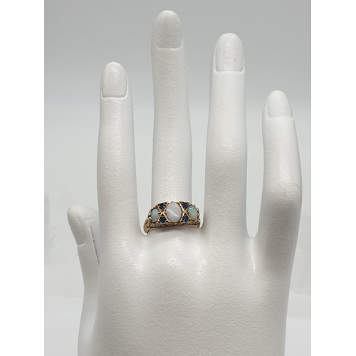 241 - Opal and Sapphire RING. 3.4g   Size P.