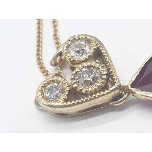 332 - Large PENDANT 10ct Ruby & 3 x Diamonds on 
9ct fine CHAIN.   5.1g.  46cm length.