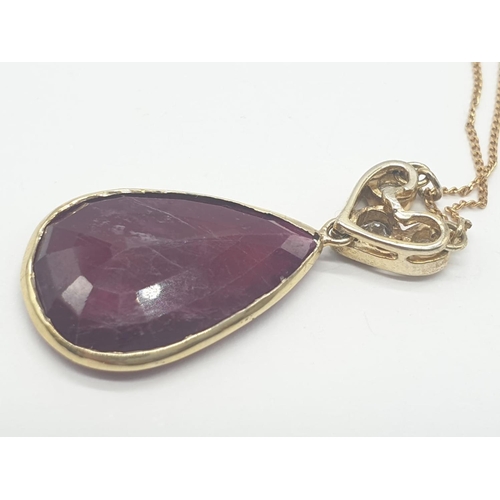 332 - Large PENDANT 10ct Ruby & 3 x Diamonds on 
9ct fine CHAIN.   5.1g.  46cm length.