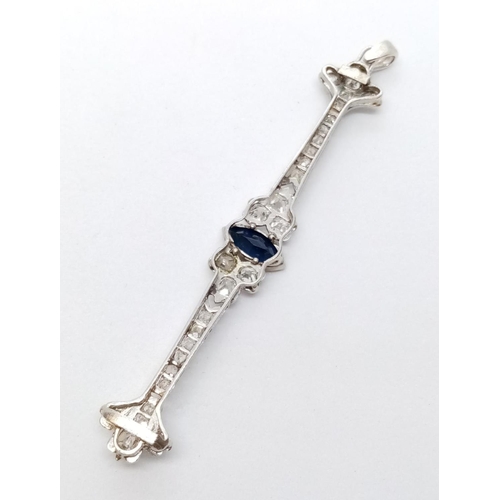 394 - Platinum PENDANT with Diamonds and Sapphire.  5.1g   6.5cm drop.