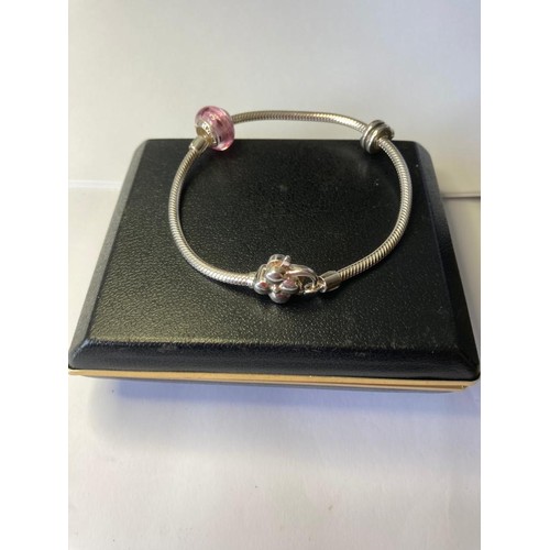 130 - Silver Lovelinks bracelet with full hallmark having silver flower clasp and hallmarked silver charms... 