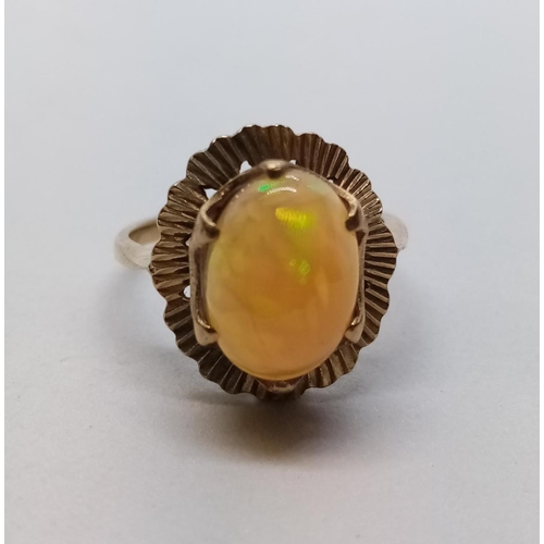 339 - Fine Opal set in 9 cg Gold RING.  3.0g  Size  M.