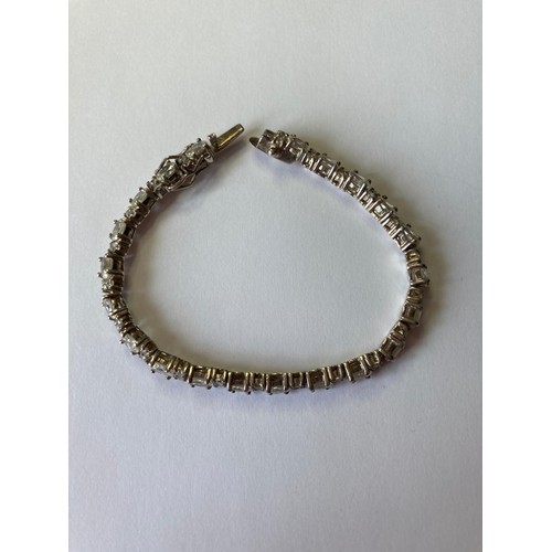 363 - Silver stone set tennis bracelet. Shorter length suitable for very slim wrist or teenager. 15cm appr... 