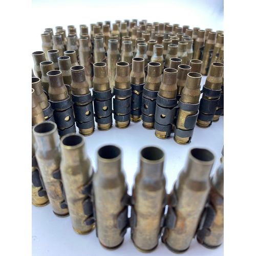 236 - 128 x INERT General-Purpose Machine-Gun rounds and link.