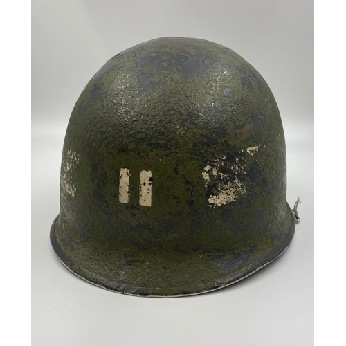 31 - WW2 Front Seam Swivel Bale US M1 Helmet made by Schlueter. The batch number on the rim dates it as 1... 