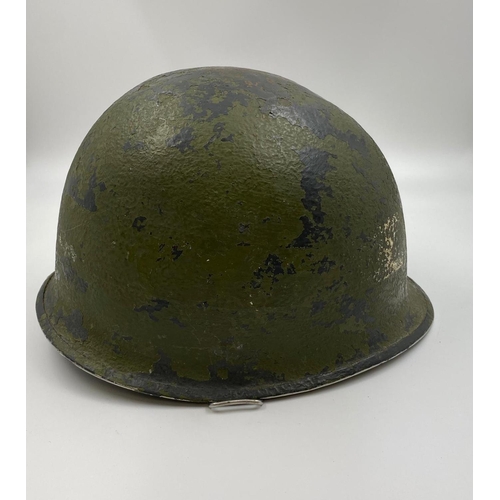 31 - WW2 Front Seam Swivel Bale US M1 Helmet made by Schlueter. The batch number on the rim dates it as 1... 