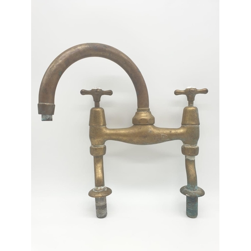 369 - Victorian brass mixer taps made by Knowles of London wing the bi-flo patented system.