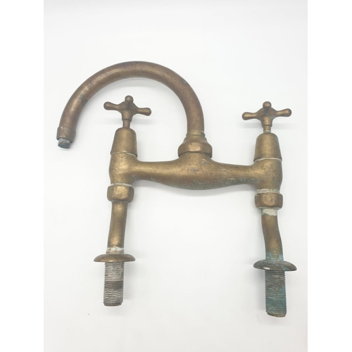 369 - Victorian brass mixer taps made by Knowles of London wing the bi-flo patented system.