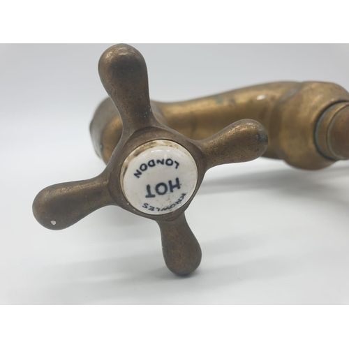 369 - Victorian brass mixer taps made by Knowles of London wing the bi-flo patented system.