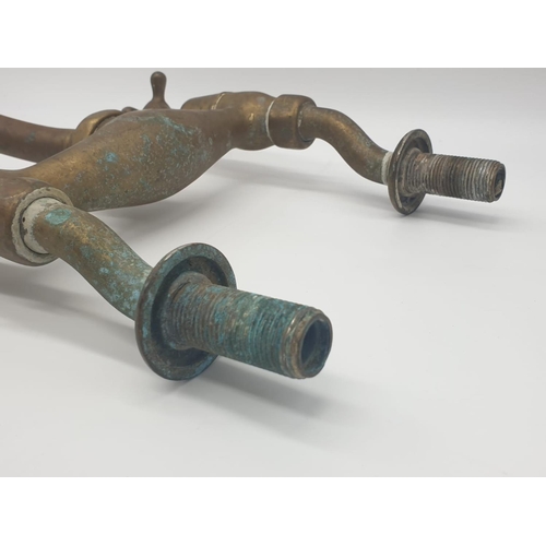 369 - Victorian brass mixer taps made by Knowles of London wing the bi-flo patented system.