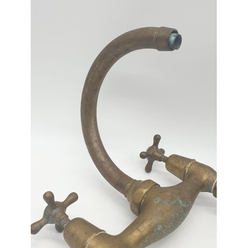 369 - Victorian brass mixer taps made by Knowles of London wing the bi-flo patented system.