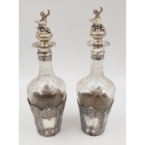 1024 - A beautiful pair of antique silver etching bottles. Dated London 1896 and imported by Berthold Mulle... 