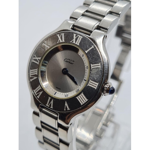 135 - Must de Cartier Ladies WATCH with round face and Roman Numerals. 28mm case.