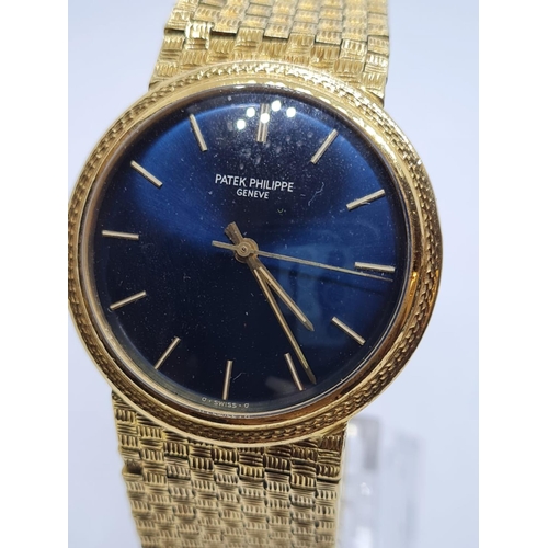 136 - Vintage Patek Philippe Geneve Gents WATCH with blue face and solid Gold strap.  Rear winder.  270920... 