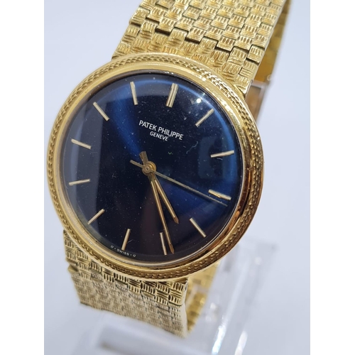 136 - Vintage Patek Philippe Geneve Gents WATCH with blue face and solid Gold strap.  Rear winder.  270920... 