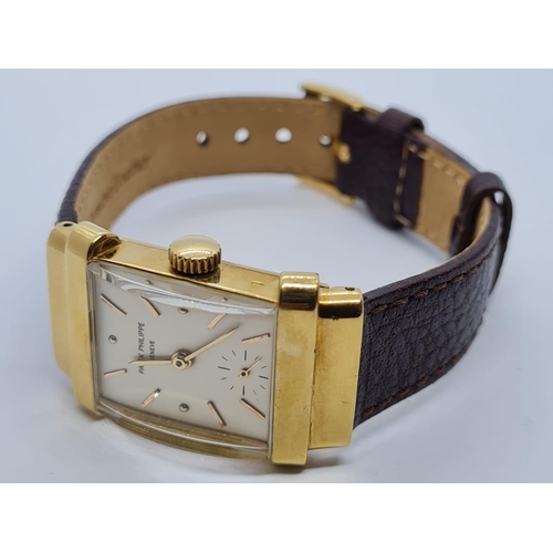 257 - Patek Philippe Geneve WATCH tank style with rectangular face Case: 20x40mm.  Brown Leather Strap.