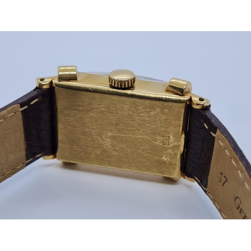 257 - Patek Philippe Geneve WATCH tank style with rectangular face Case: 20x40mm.  Brown Leather Strap.