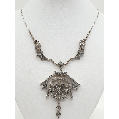 81 - 9ct Gold and Diamond Vintage PENDANT with over
3 ct of Diamonds.  42.4g     40cm length.