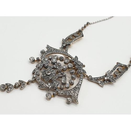 81 - 9ct Gold and Diamond Vintage PENDANT with over
3 ct of Diamonds.  42.4g     40cm length.