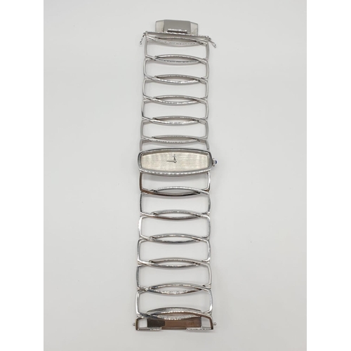 143 - Ebel 18ct White Gold Ladies Dress (Bangle strap) WATCH .  Case  43 x 17mm.  Strap is 18cm long.  108... 