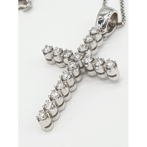 433 - 18ct White Gold Diamond Cross on a 38cm CHAIN.  5g