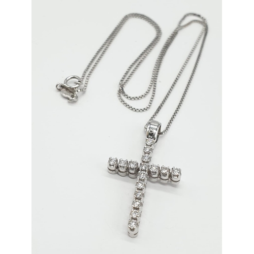 433 - 18ct White Gold Diamond Cross on a 38cm CHAIN.  5g