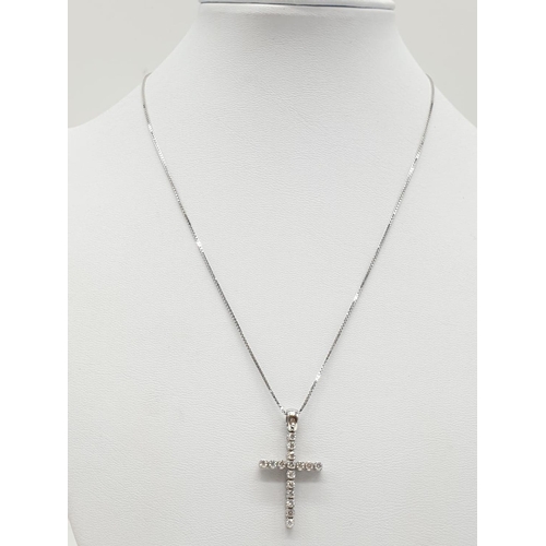 433 - 18ct White Gold Diamond Cross on a 38cm CHAIN.  5g