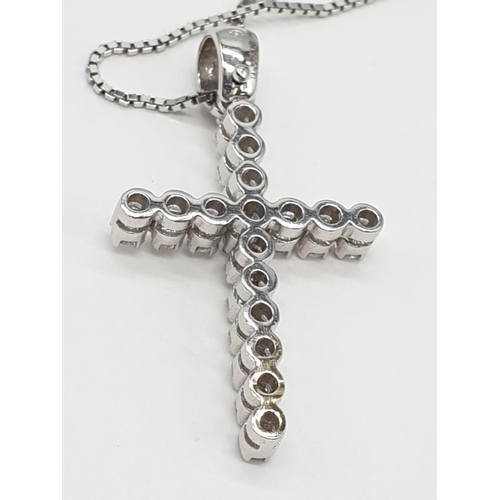 433 - 18ct White Gold Diamond Cross on a 38cm CHAIN.  5g