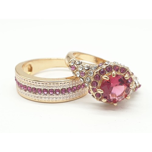 176 - A collection of five double rings (solitaire & eternity) with various gems in velvet red rose shape ... 