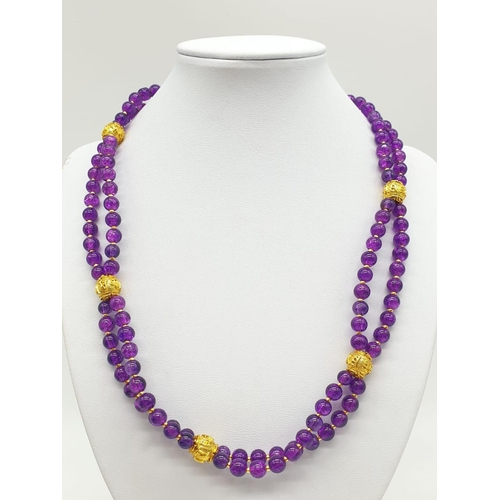 112 - A Mary Quant style necklace and earrings set with synthetic amethyst, following the philosophy of th... 