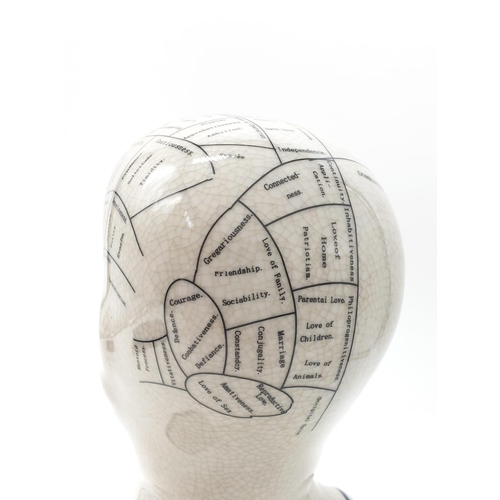 133 - A PHRENOLOGY ceramic bust with detailed mapping of the various areas of the cranial area. By L. N. F... 