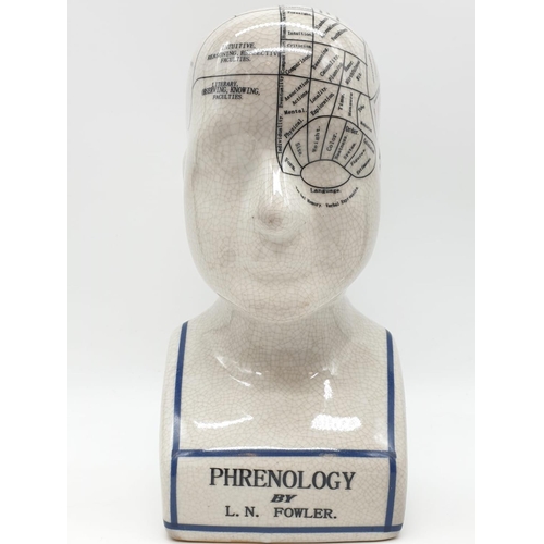 133 - A PHRENOLOGY ceramic bust with detailed mapping of the various areas of the cranial area. By L. N. F... 