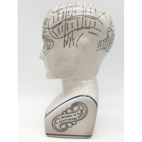 133 - A PHRENOLOGY ceramic bust with detailed mapping of the various areas of the cranial area. By L. N. F... 