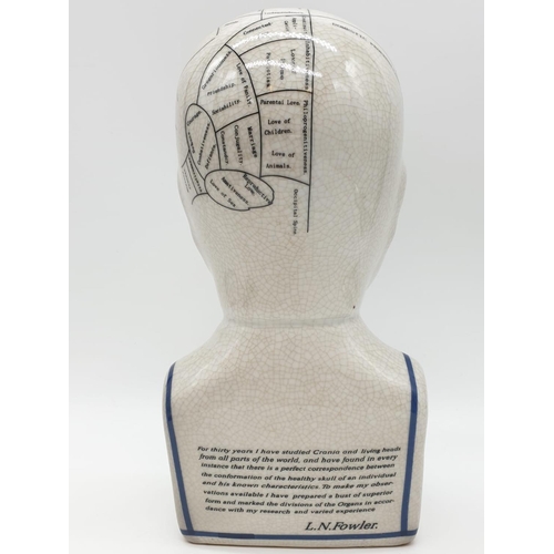 133 - A PHRENOLOGY ceramic bust with detailed mapping of the various areas of the cranial area. By L. N. F... 